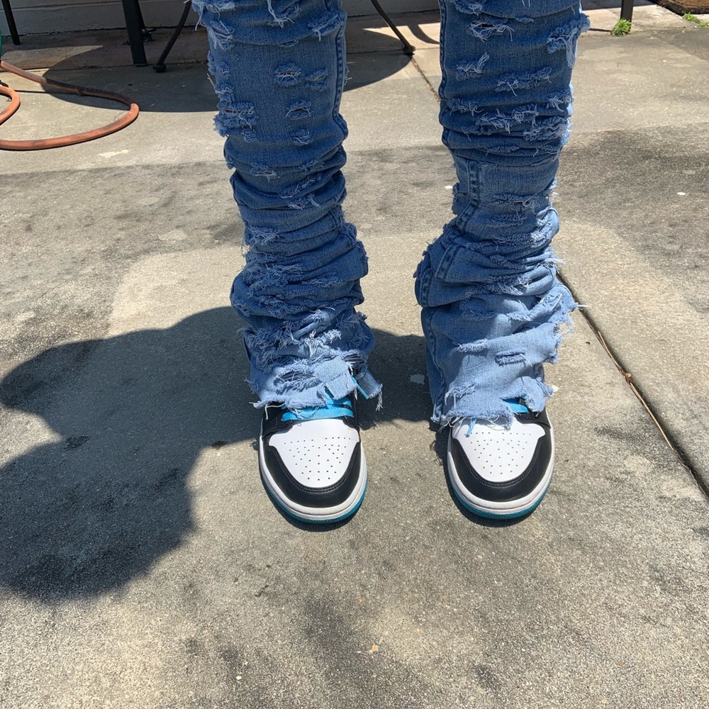 Stacked denim jeans